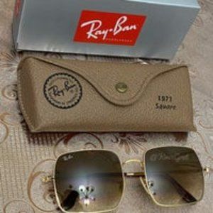 Ray Ban Sunglasses.
